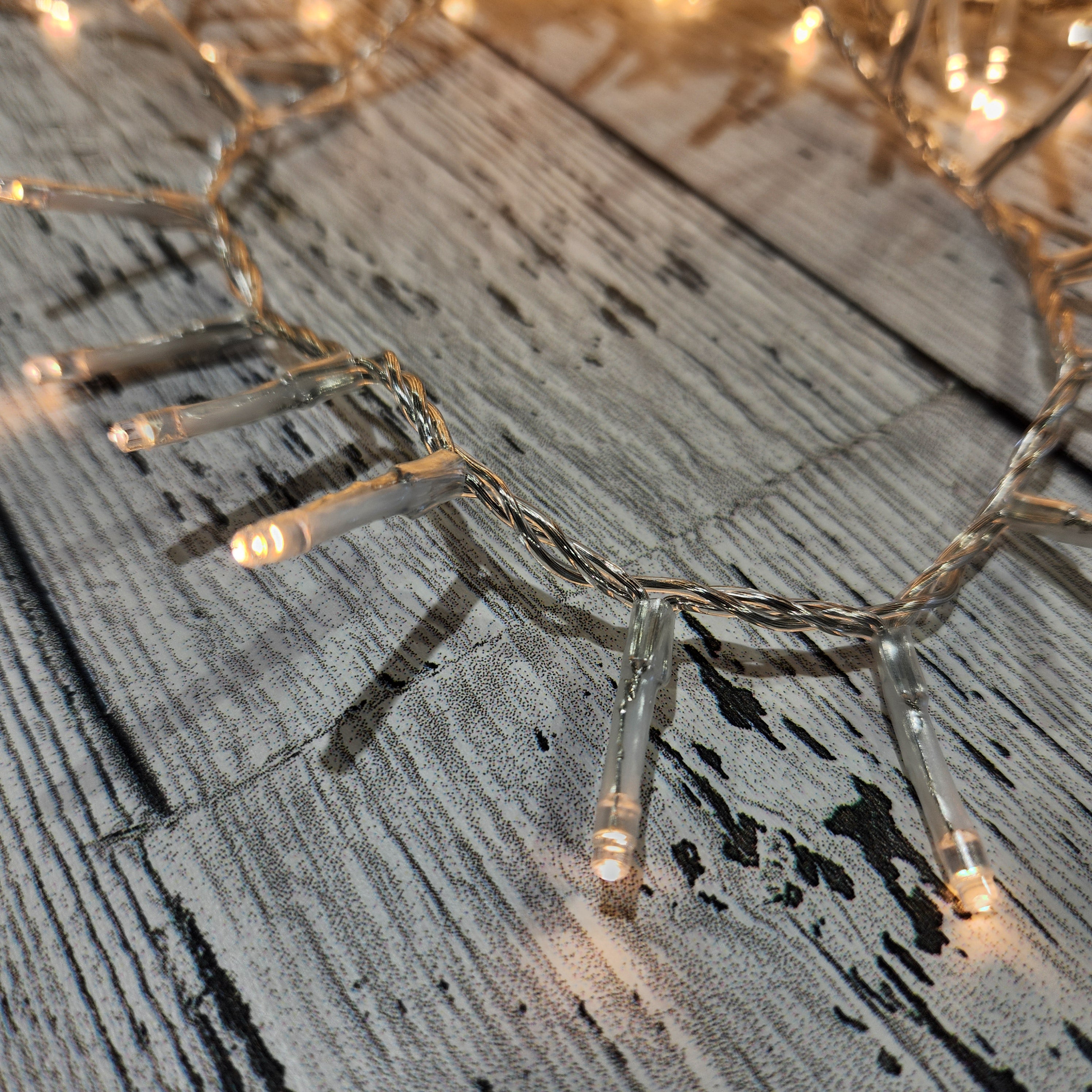 1000 Warm White LED Lights, Transparent Wire, 8 Functions, 74'