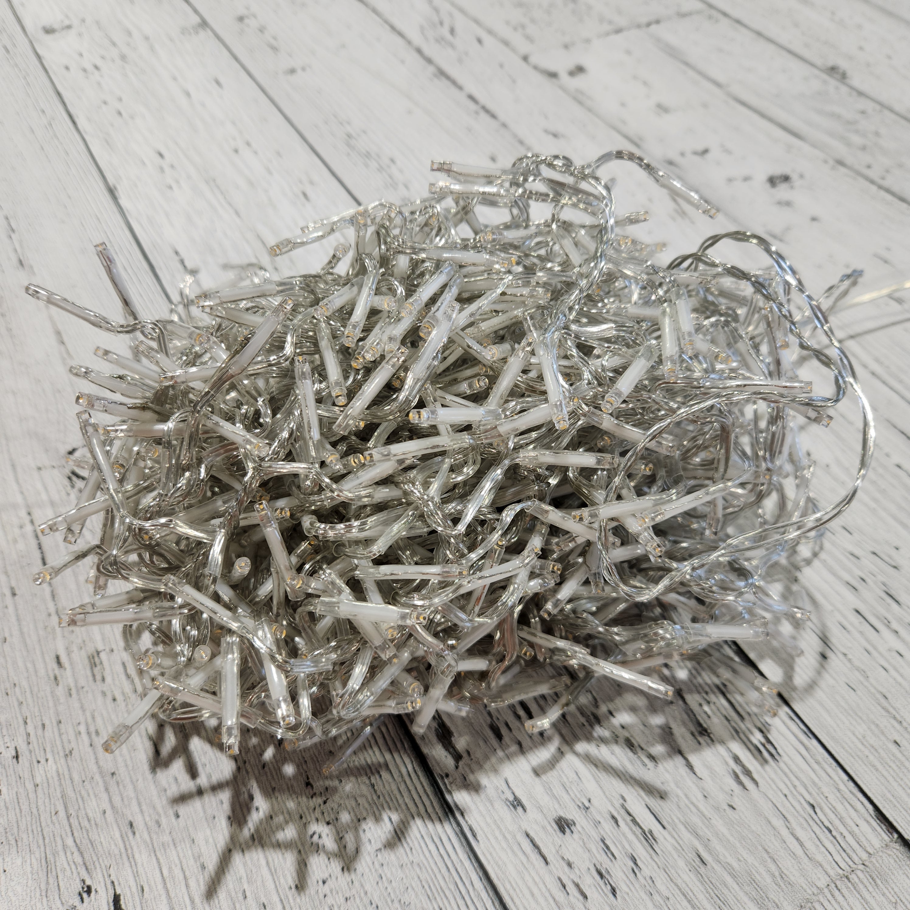 768 lumières DEL en grappe blanc chaud, fil transparent, extérieur, 20'