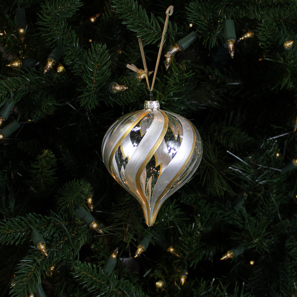 Boule en verre oignon tourbillon de paillettes argent transparent 4"