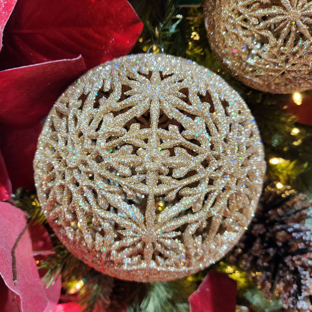 Boule étoile rayonnante brillante dorée 8"